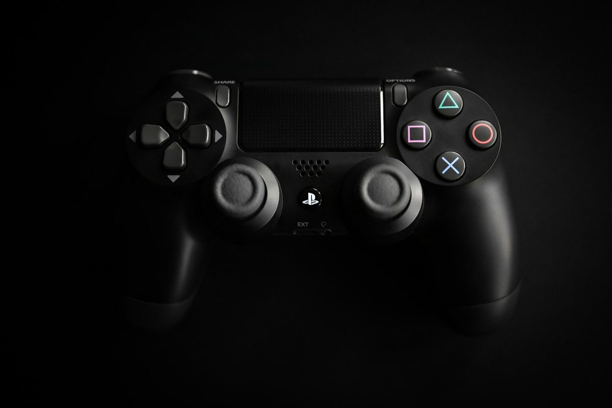 Black controller on a dark background