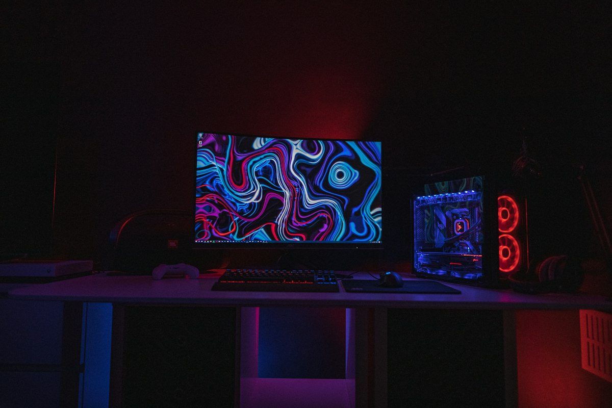Gaming monitor with colorful display in a dark room